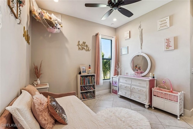 bedroom featuring ceiling fan and light tile patterned floors