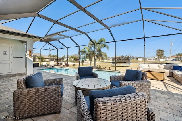 view of patio / terrace featuring a lanai and an outdoor hangout area