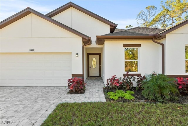 view of front of property featuring a garage