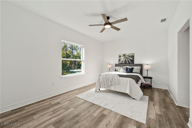 bedroom featuring ceiling fan and wood-type flooring