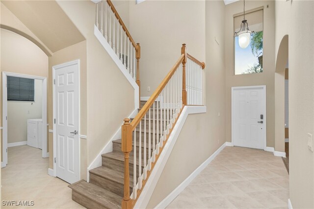 entrance foyer featuring a high ceiling