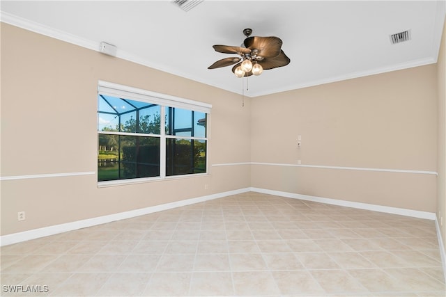 unfurnished room with ceiling fan and crown molding