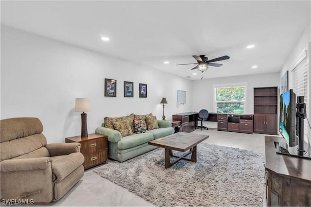 living room featuring ceiling fan