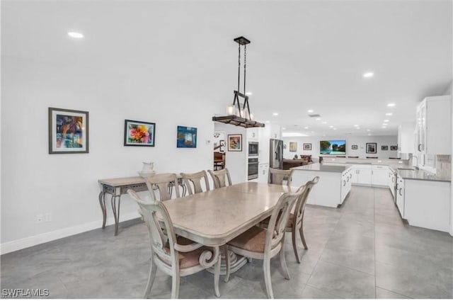 dining room featuring sink