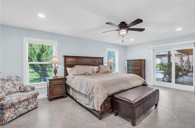 bedroom with access to outside and ceiling fan