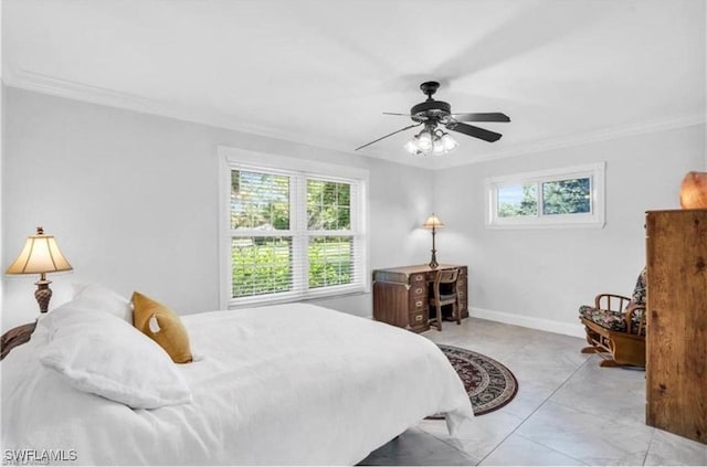 bedroom featuring multiple windows, ceiling fan, and crown molding