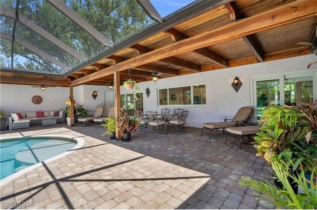 view of pool with an outdoor hangout area, ceiling fan, and a patio area