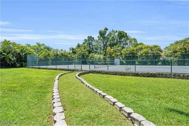 exterior space with tennis court