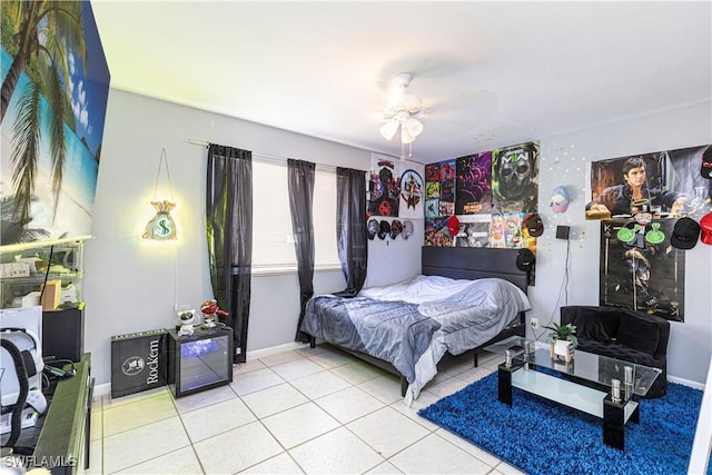 bedroom with light tile patterned floors and ceiling fan