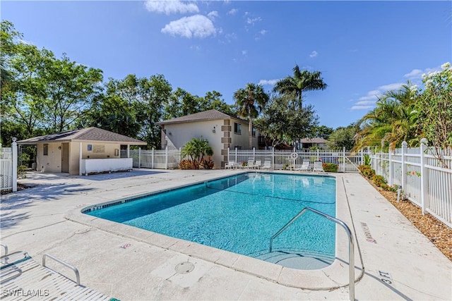 view of pool featuring a patio