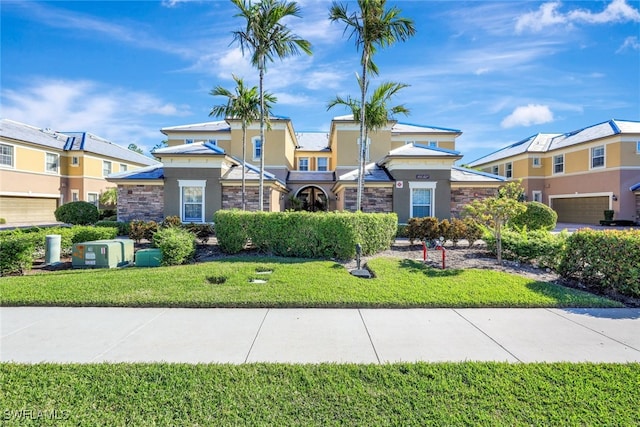 view of front of home with a front yard