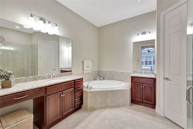 bathroom featuring tile patterned floors, vanity, ceiling fan, and plus walk in shower