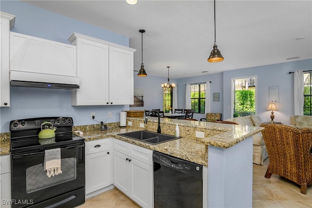 kitchen featuring kitchen peninsula, sink, hanging light fixtures, and black appliances