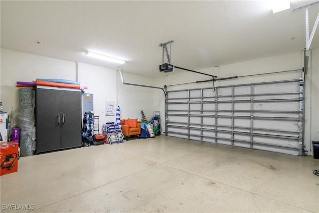 garage featuring a garage door opener