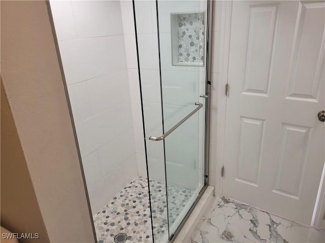 bathroom featuring walk in shower