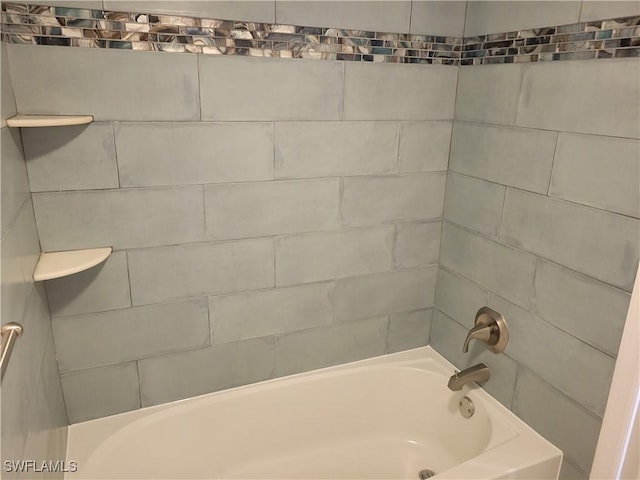 bathroom with shower / bathing tub combination