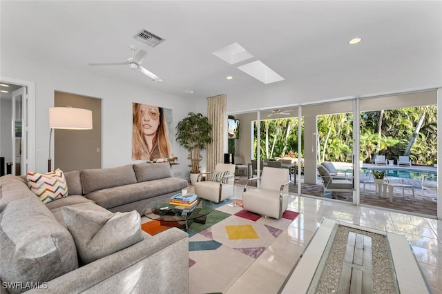 tiled living room with ceiling fan