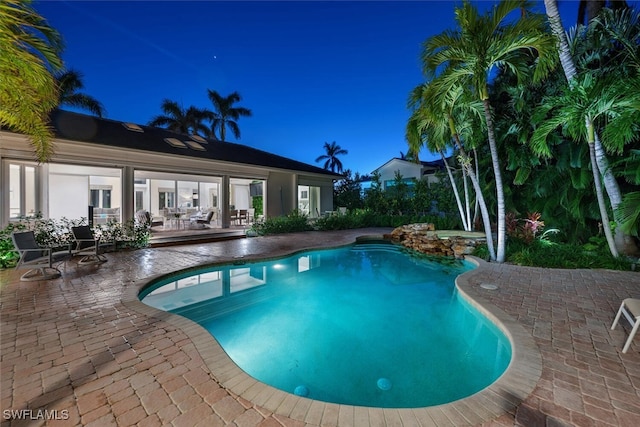 view of pool with a patio area