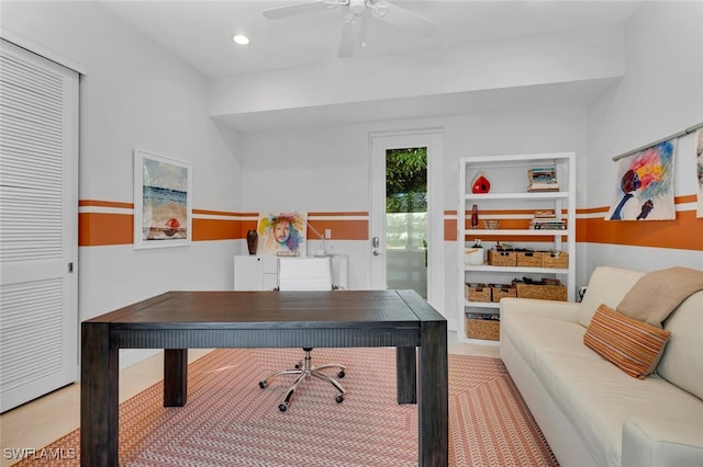 office space featuring ceiling fan and light tile patterned flooring