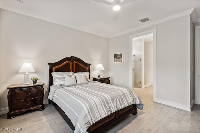 bedroom featuring ensuite bathroom, ceiling fan, light hardwood / wood-style floors, and ornamental molding