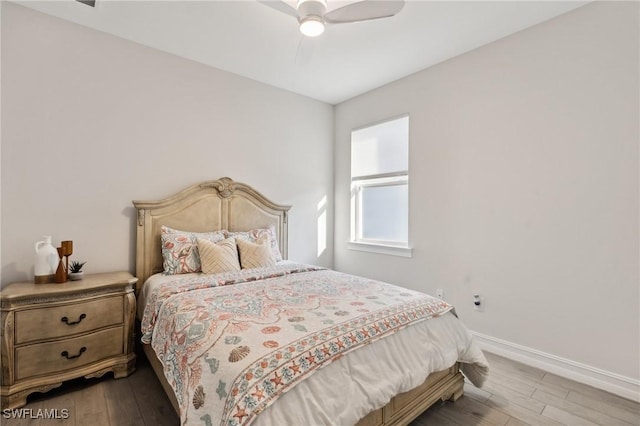 bedroom featuring wood-type flooring and ceiling fan