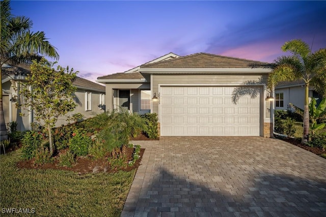 view of front of property featuring a garage