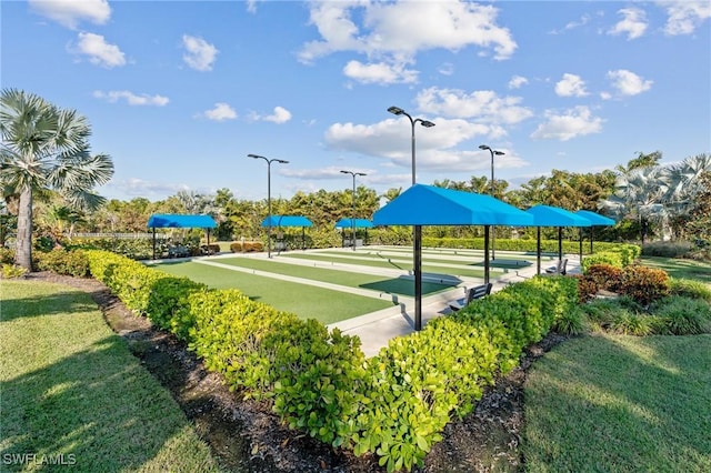 view of home's community featuring a yard