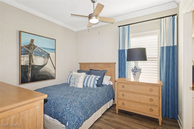 bedroom with crown molding, ceiling fan, and dark wood-type flooring