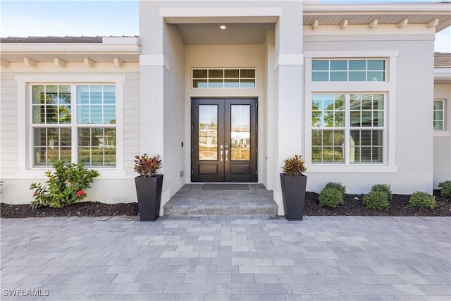 15844 Cranes Marsh Ct, Punta Gorda, FL 33982 - property entrance featuring french doors and stucco siding
