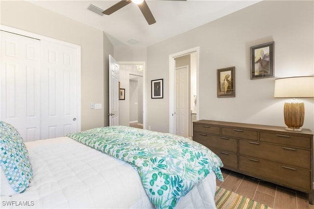 bedroom featuring ceiling fan, a closet, and light hardwood / wood-style flooring