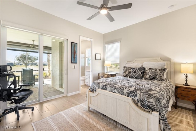 bedroom with access to outside, connected bathroom, ceiling fan, and multiple windows