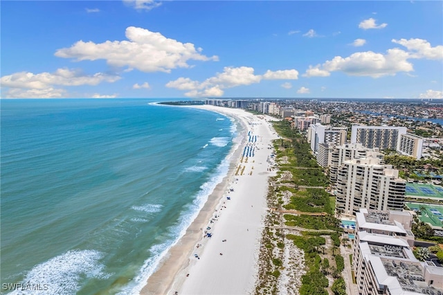 drone / aerial view with a view of the beach and a water view