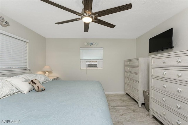 bedroom featuring ceiling fan and cooling unit