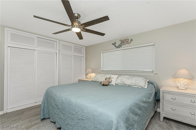 bedroom with ceiling fan and hardwood / wood-style floors