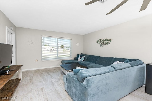 living room featuring ceiling fan