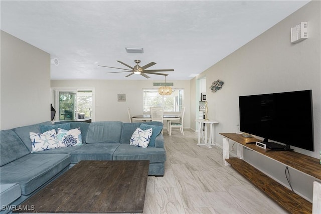 living room with ceiling fan