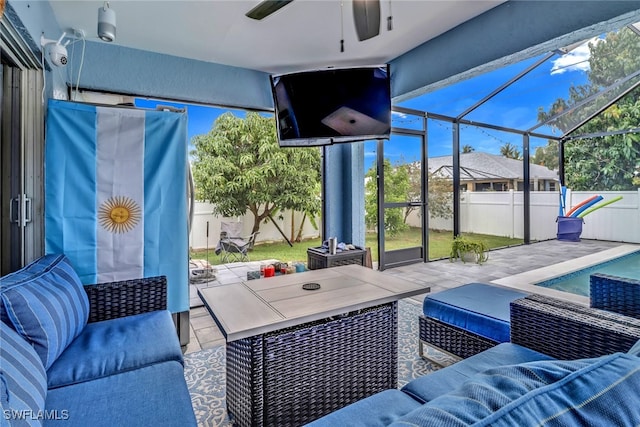 709 SW 9th Ct, Cape Coral, FL 33991 - fenced backyard featuring a ceiling fan, outdoor lounge area, a patio, and a lanai