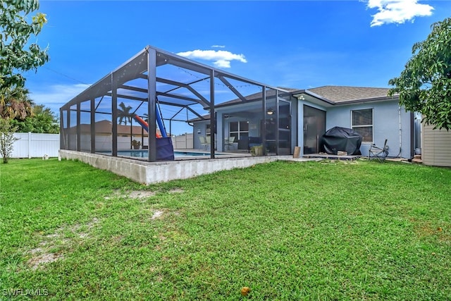 709 SW 9th Ct, Cape Coral, FL 33991 - back of house with glass enclosure and a patio area