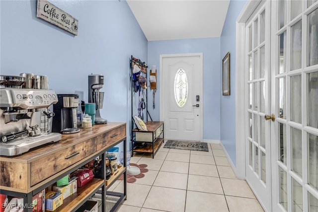 709 SW 9th Ct, Cape Coral, FL 33991 - tiled foyer entrance with french doors