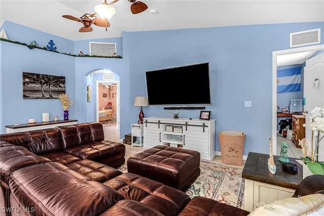 709 SW 9th Ct, Cape Coral, FL 33991 - living area with arched walkways and ceiling fan