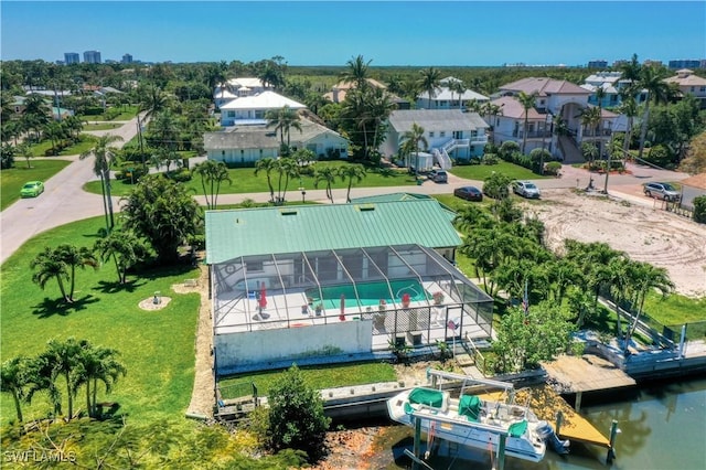 bird's eye view with a water view