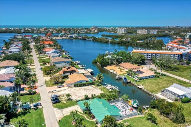 bird's eye view with a water view