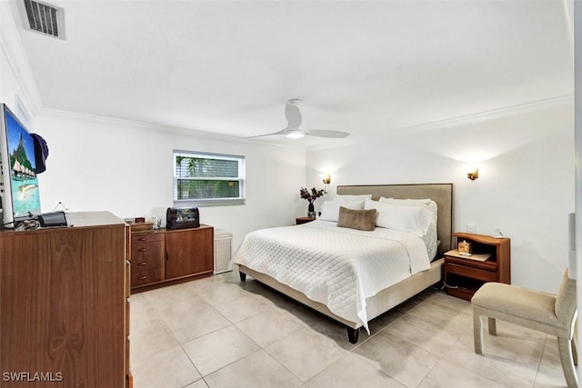 tiled bedroom with ceiling fan and crown molding