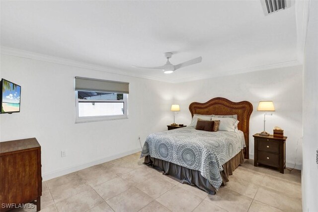 tiled bedroom featuring ceiling fan and ornamental molding