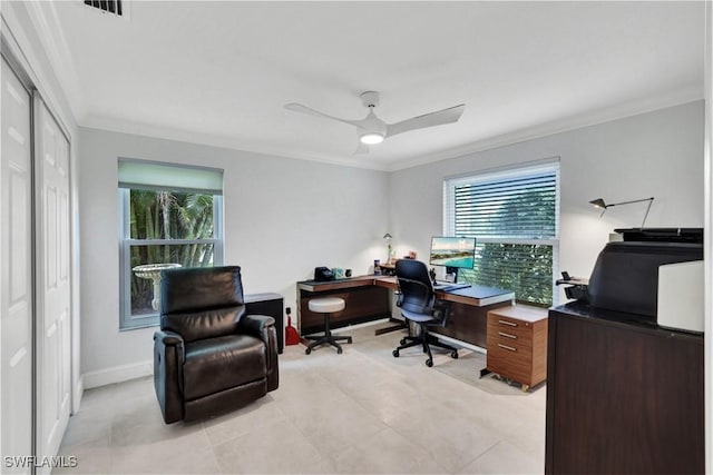 office area with ceiling fan, plenty of natural light, and ornamental molding