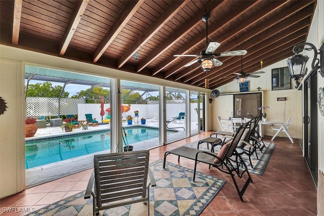 view of pool featuring ceiling fan, a lanai, and a patio