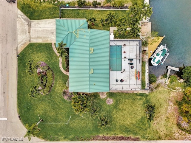 birds eye view of property featuring a water view