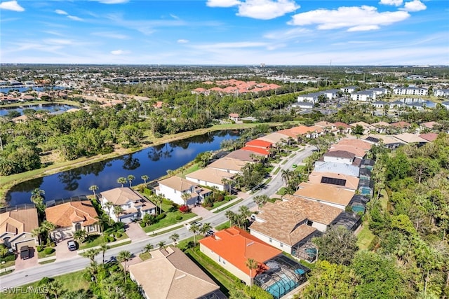 aerial view featuring a water view and a residential view