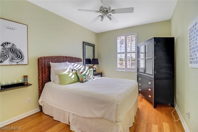 bedroom featuring ceiling fan and light wood-type flooring