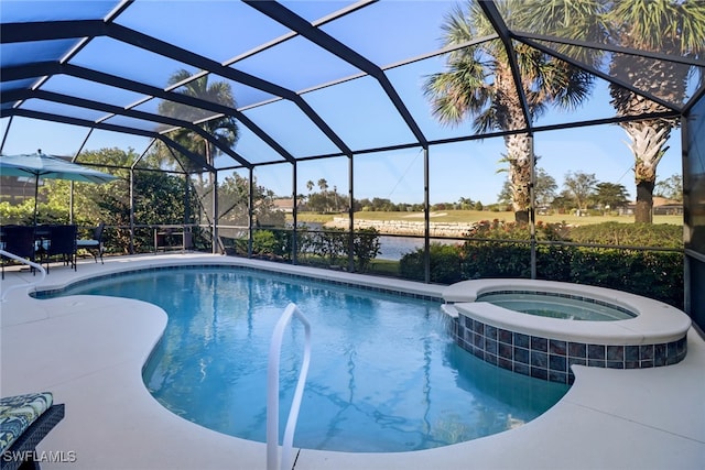 view of pool with an in ground hot tub, glass enclosure, central AC unit, and a patio area